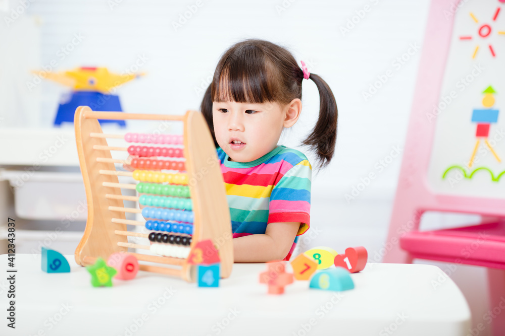 young girl learn counting by using abacus for homeschooling young girl learn counting by using abacus for homeschooling