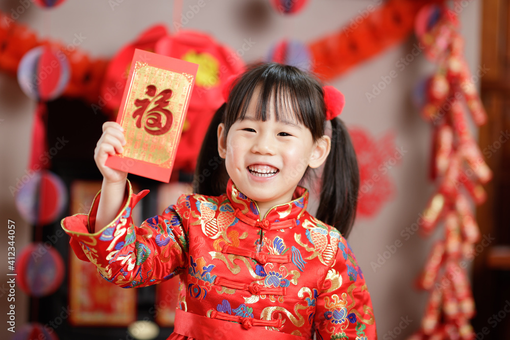 Chinese young girl traditional dressing up with a Chinese young girl traditional dressing up with a
