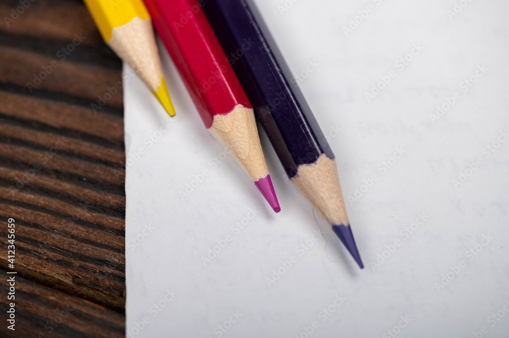 A few colored pencils. Close-up, selective focus. A few colored pencils. Close-up, selective focus.