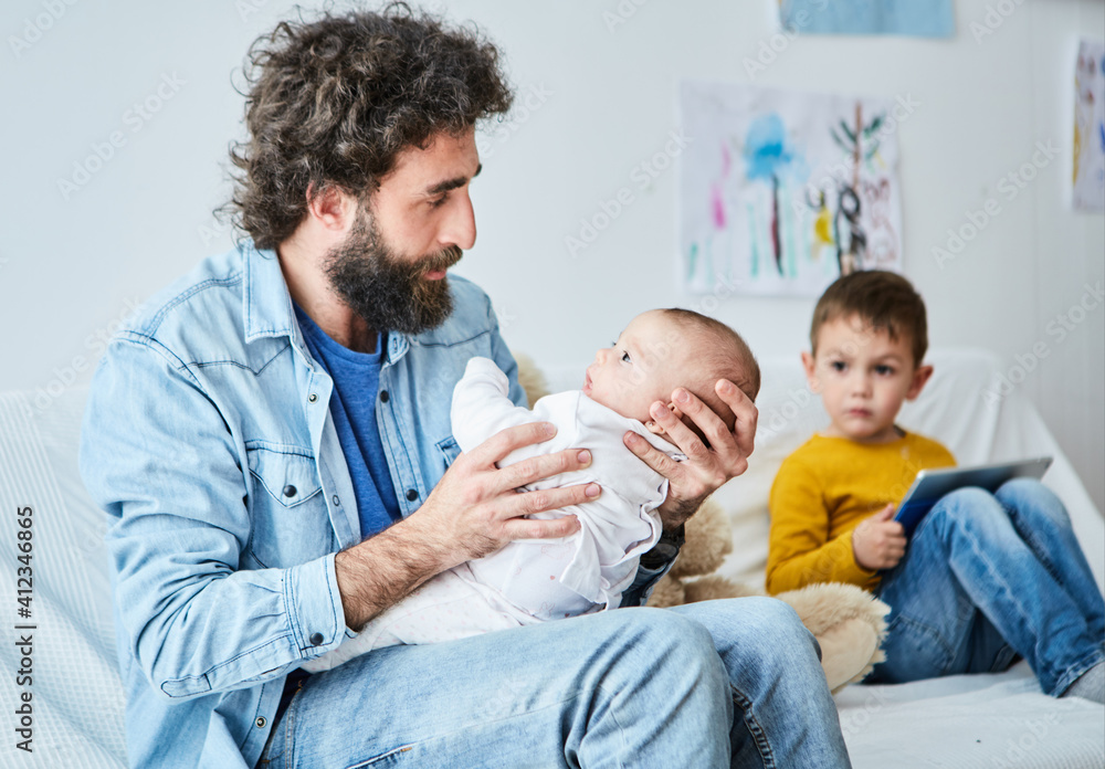 Father with lovely baby on hands. Father with lovely baby on hands.