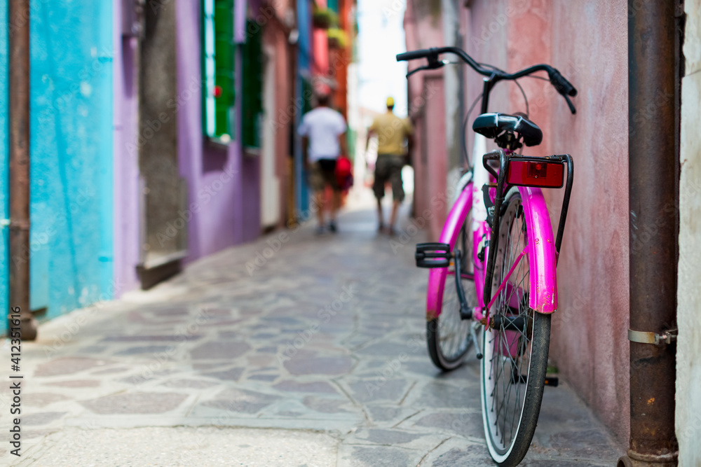 Bicycle leaning on wall Bicycle leaning on wall