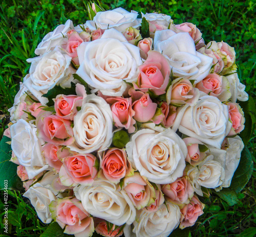 Wedding bouquet of pinkand white and pink roses.