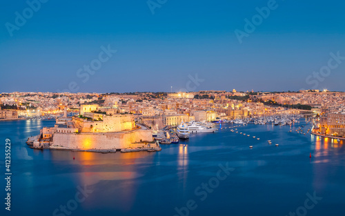 Valletta, Malta - Evening View from Upper Barrakka Gardens across the Grand Harbour photo