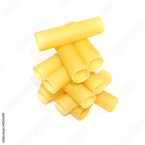 Yellow cannelloni pasta isolated on white background