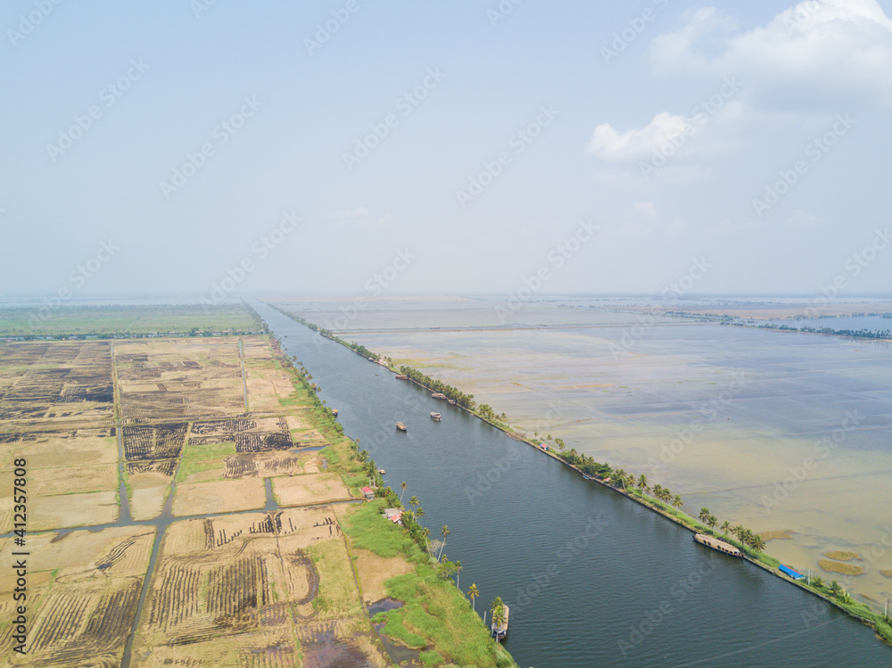 Aerial view of houseboats on the backwaters of Kerala, India Aerial view of houseboats on the backwaters of Kerala, India
