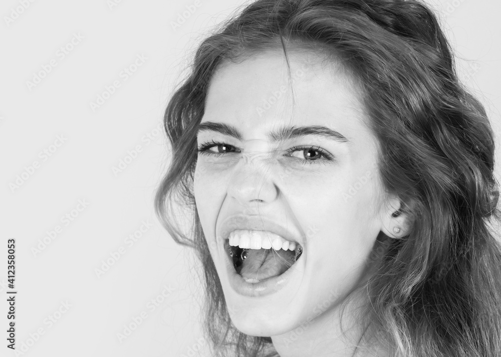 Shouting woman. Girl face scream closeup. Woman with shocked face. Shouting woman. Girl face scream closeup. Woman with shocked face.