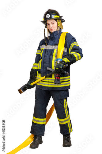 Full-length young brave woman in uniform and hardhat of fireman with fire hose on shoulders and sledgehammer in hands isolated on white background. 