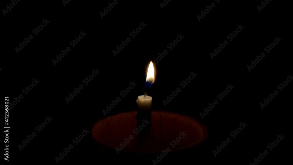Hand man inflaming a match on matchstick box lighting candle on dark background. Hand man inflaming a match on matchstick box lighting candle on dark background.