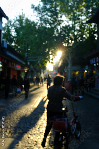 Wallpaper Mural women riding motorcycle on street in city Torontodigital.ca