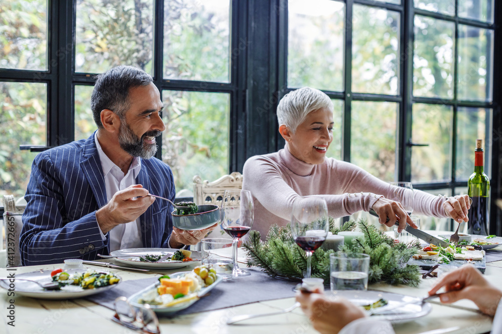 Couple Having Dinner With Friends Couple Having Dinner With Friends