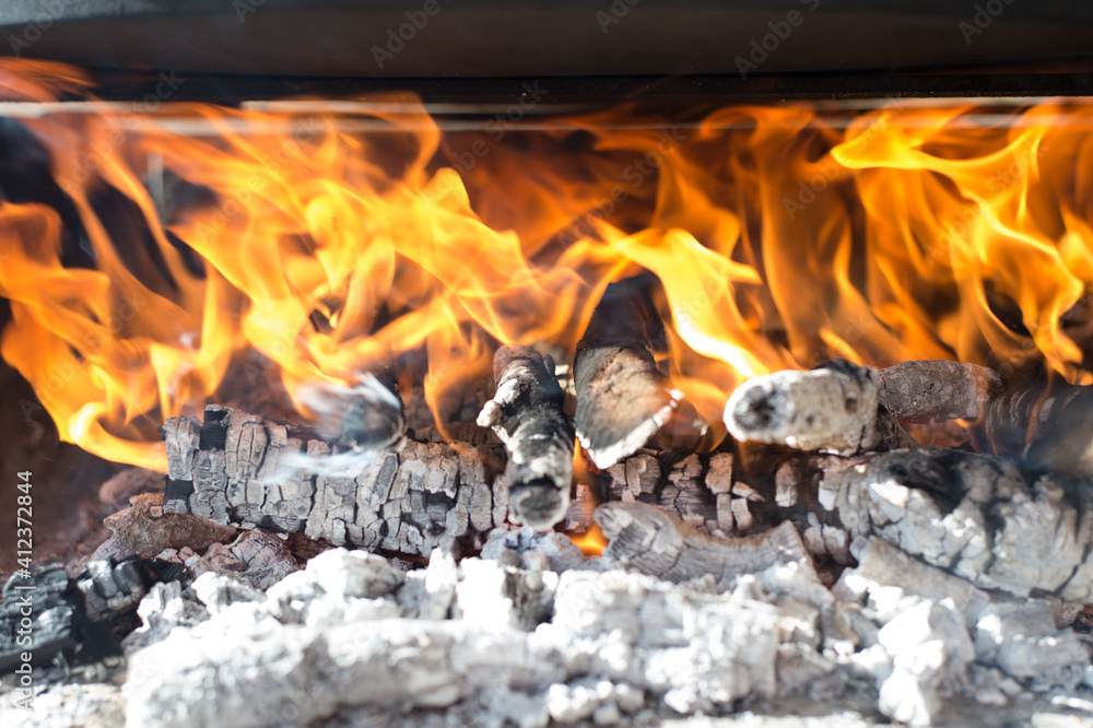 Fire made with oak firewood to cook the paella in the traditional