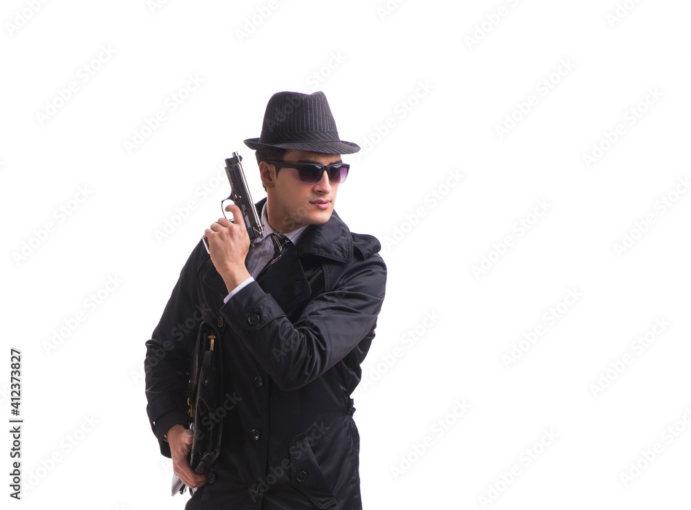Man spy with handgun isolated on white background Man spy with handgun isolated on white background
