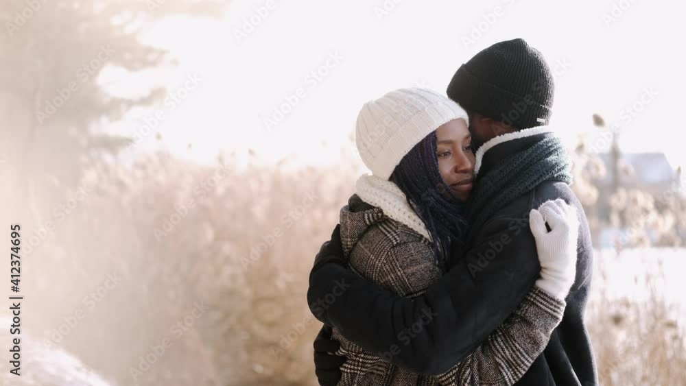 Couple hugging in snow. Enjoying their winter vacation. Couple hugging in snow. Enjoying their winter vacation.