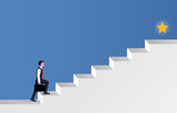 Businessman walking the stair for success symbol.
