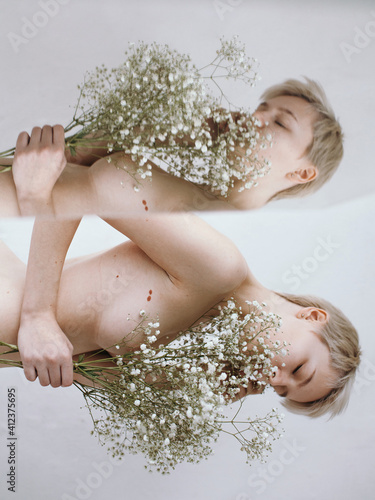 Nude with flowers photo