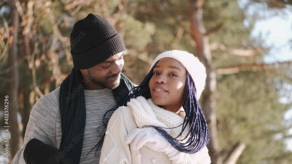Couple hugging in snow. Enjoying their winter vacation. Couple hugging in snow. Enjoying their winter vacation.