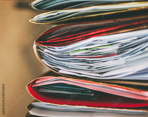 Stack of documents folders on office. photo