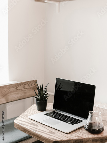 Wallpaper Mural Laptop on table against cozy window Torontodigital.ca