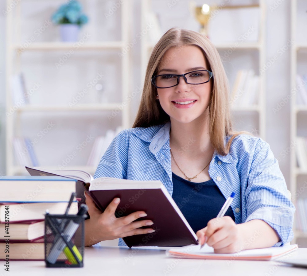 Young teenage female student preparing for exams at home Young teenage female student preparing for exams at home