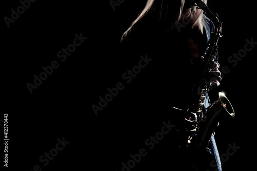 Canvas Print Saxophone player playing jazz music. Saxophonist musicians