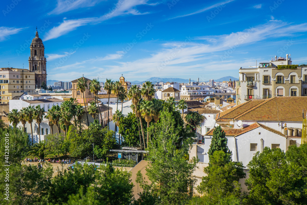 View on Malaga in Andalucia (Spain) from the Alcazaba mirador. We cann the cathedral, the palm trees and the historic center