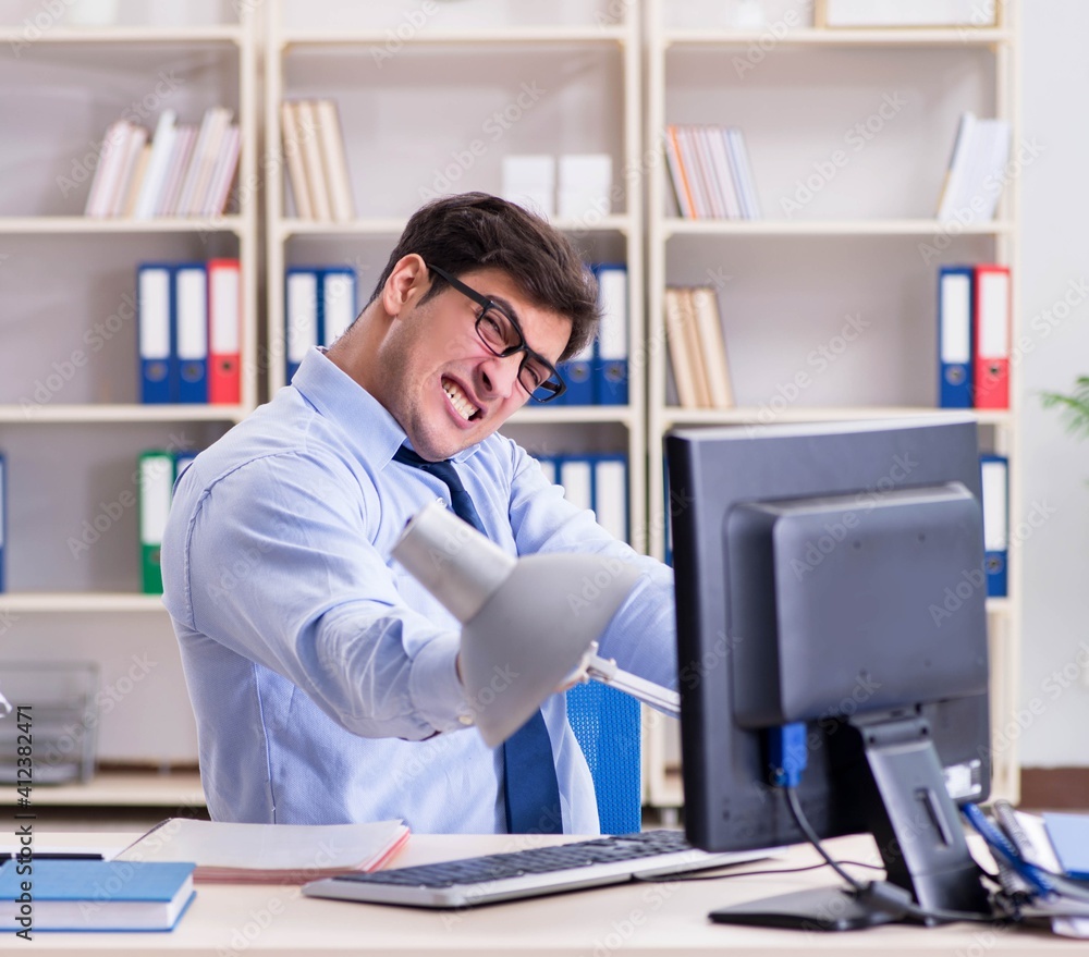 Angry businessman frustrated with too much work Angry businessman frustrated with too much work