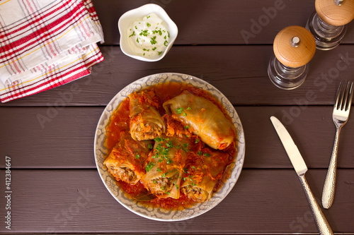 Cabbage rolls with meat, rice and vegetables. Chou farci, dolma, sarma, golubtsi or golabki. View from above, top view photo