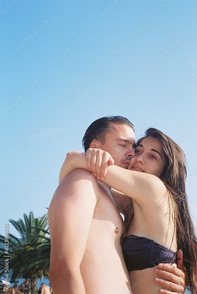 Happy couple in love hugging at the seaside Happy couple in love hugging at the seaside