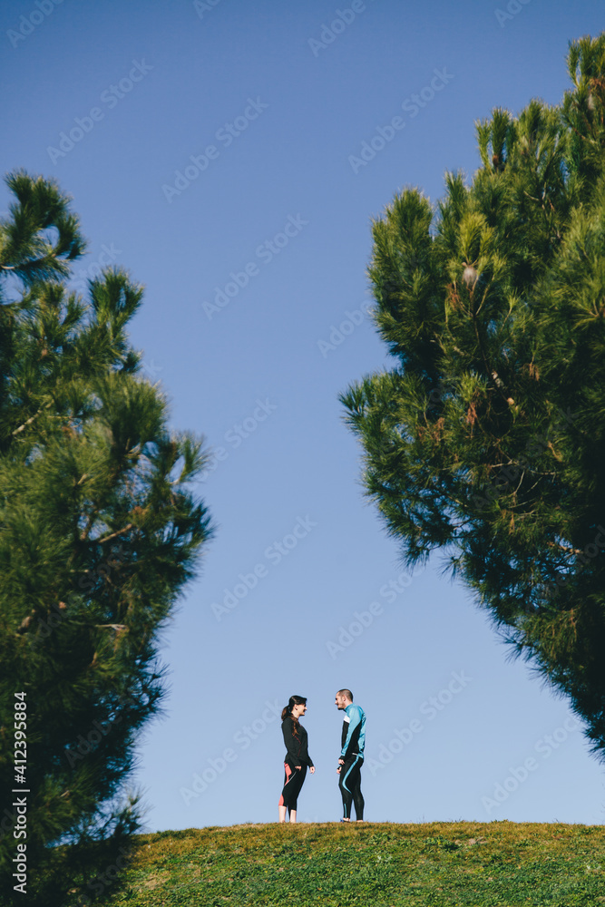 Runners Resting in a Nature Scenery