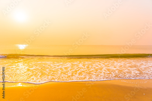 Beautiful tropical beach sea ocean with sky at sunrise or sunset