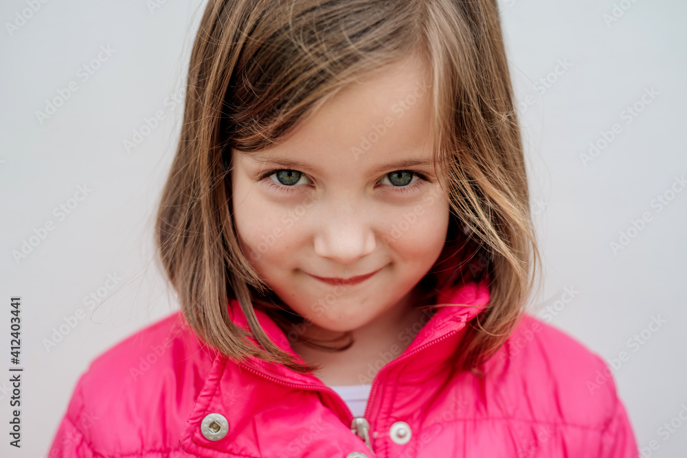 Young girl looking at camera