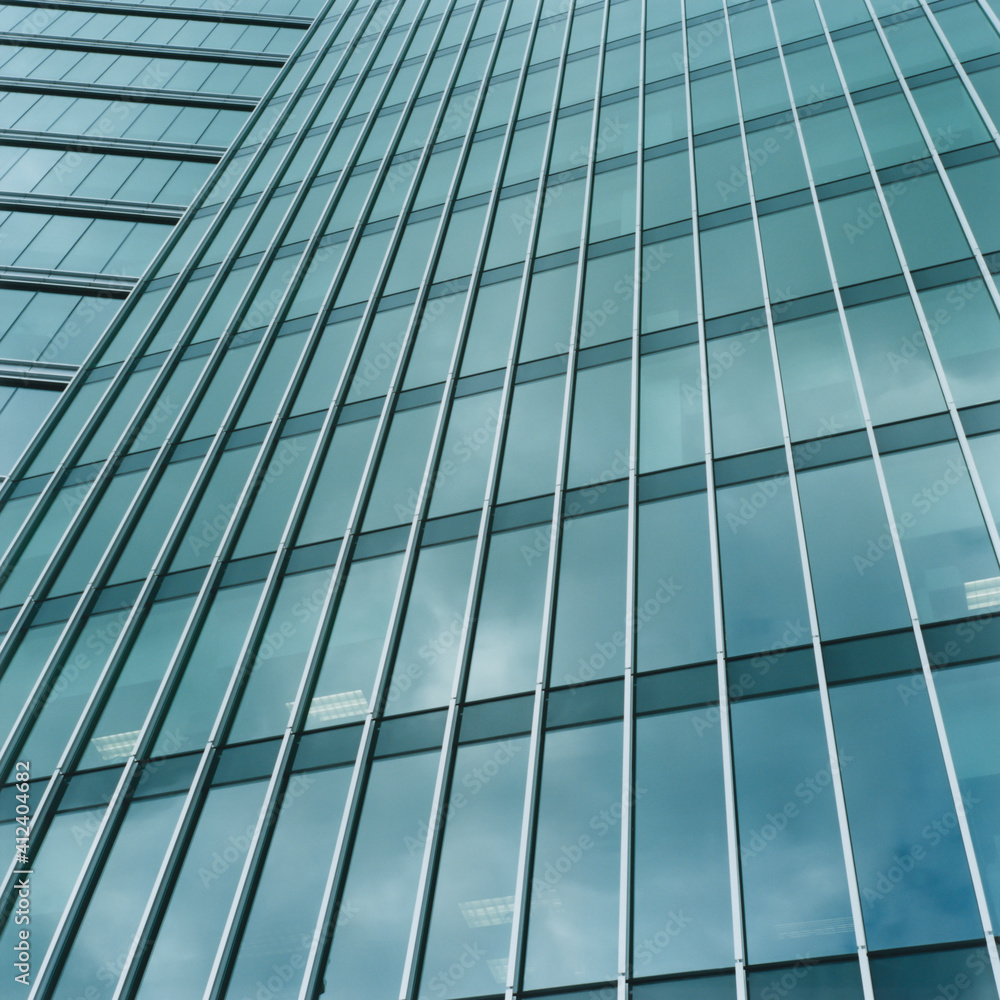 Exterior of modern office building, low angle view Exterior of modern office building, low angle view