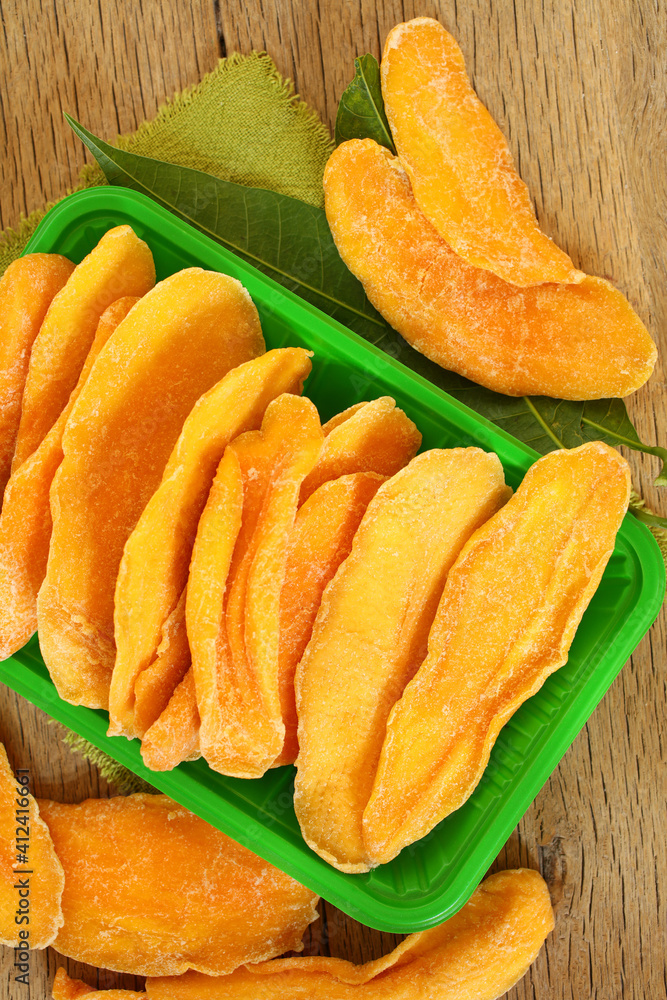 dried mango on wooden background