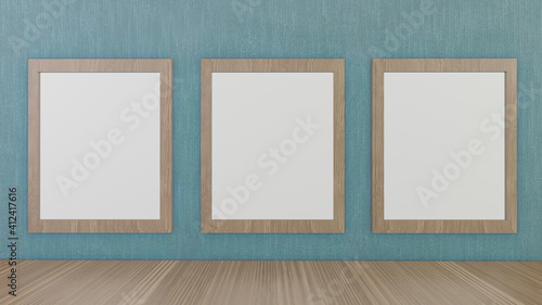 The blank picture frames on green wallpaper for background 3d rendering