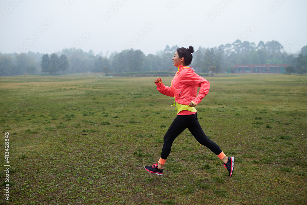 pretty young asian woman running outdoor pretty young asian woman running outdoor