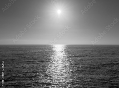 Beautiful sunset at Sunset Cliffs in black and white in San Diego, CA.