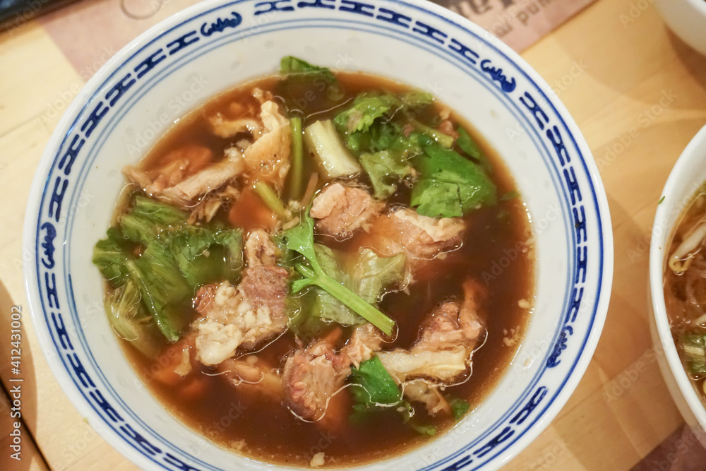 Boiled beef soup wih vegetables topping - Chinese style Boiled beef soup wih vegetables topping - Chinese style