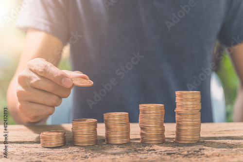Konstfotografi Man collating coins. The concept of financial growth.
