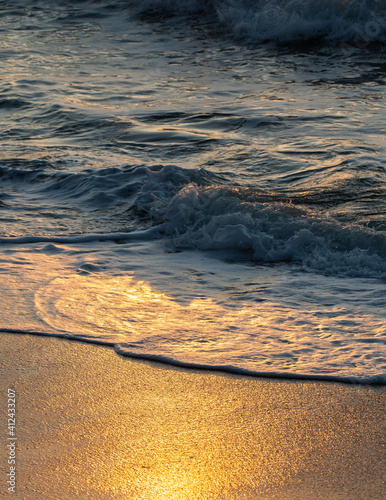 Sea Waves splash with sunlight