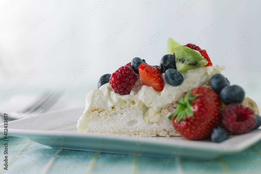 Pavlova slice with summer berries horizontal Pavlova slice with summer berries horizontal