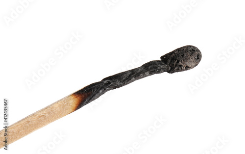 Burnt out match on white background, closeup