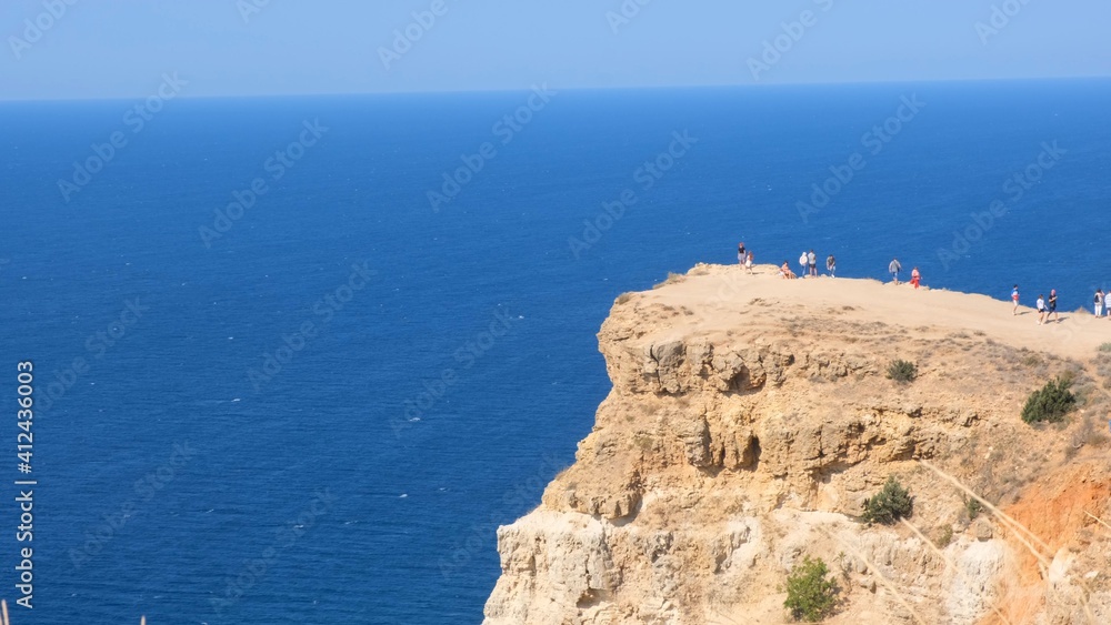 beach on cape Fiolent in Sevastopol, Crimea. View from the top of the rock. blue sea, sunny day clear sky background. The concept of place for summer travel and rest.