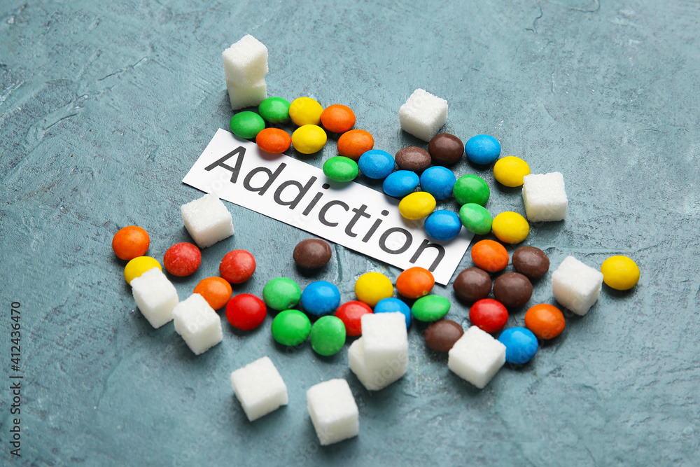 Different sweets on color background. Concept of addiction Different sweets on color background. Concept of addiction
