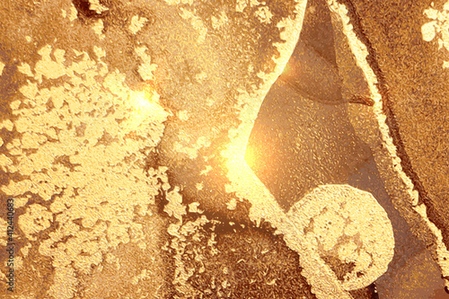 Abstract gold and brown marble texture with sparkles. Vector background in alcohol ink technique. Modern paint with glitter. Template for banner, poster design. Fluid art painting