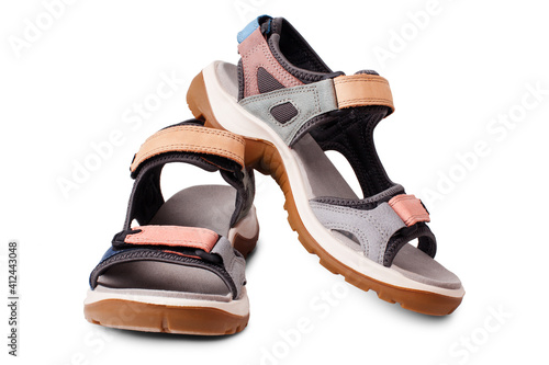 Suede sandals, velcro straps, flat sole white background isolated close up, trekking sandal shoes, pair of nubuck leather sport footwear, two summer colorful walking boots, casual comfortable footgear