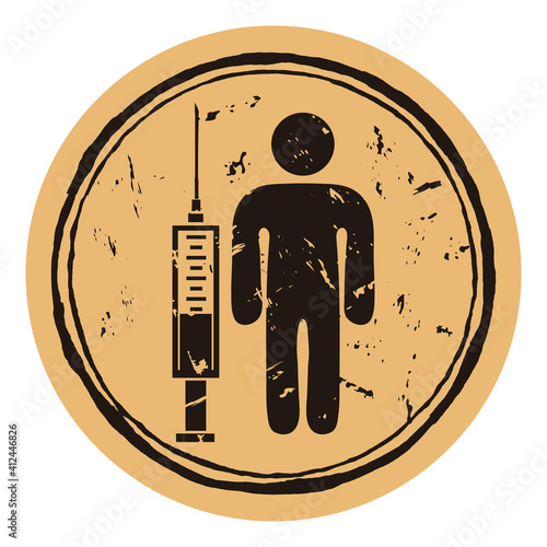 Syringe with vaccination and person. Anti Coronavirus disease COVID-19 grunge rubber round stamp on craft background. Vaccine defeats coronavirus 2019-nCoV COVID. 