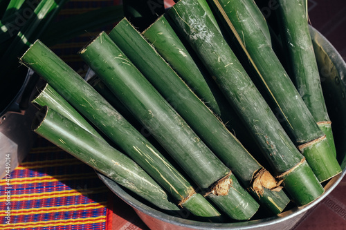 Green bamboo tube in the basket