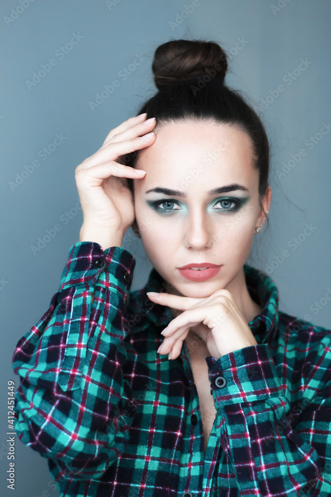 Beautiful young model, longhair girl with bright make-up, smoky eyes