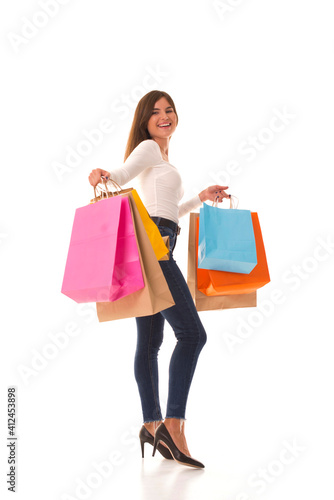 Young brunette with shopping after shopping.