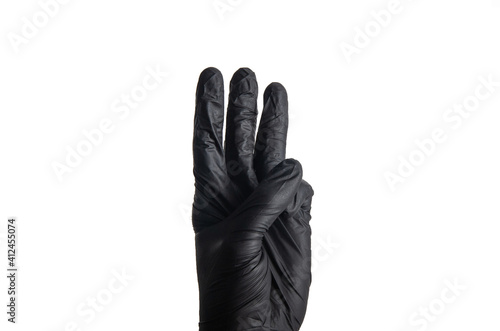Isolate men hand's in a black rubber glove